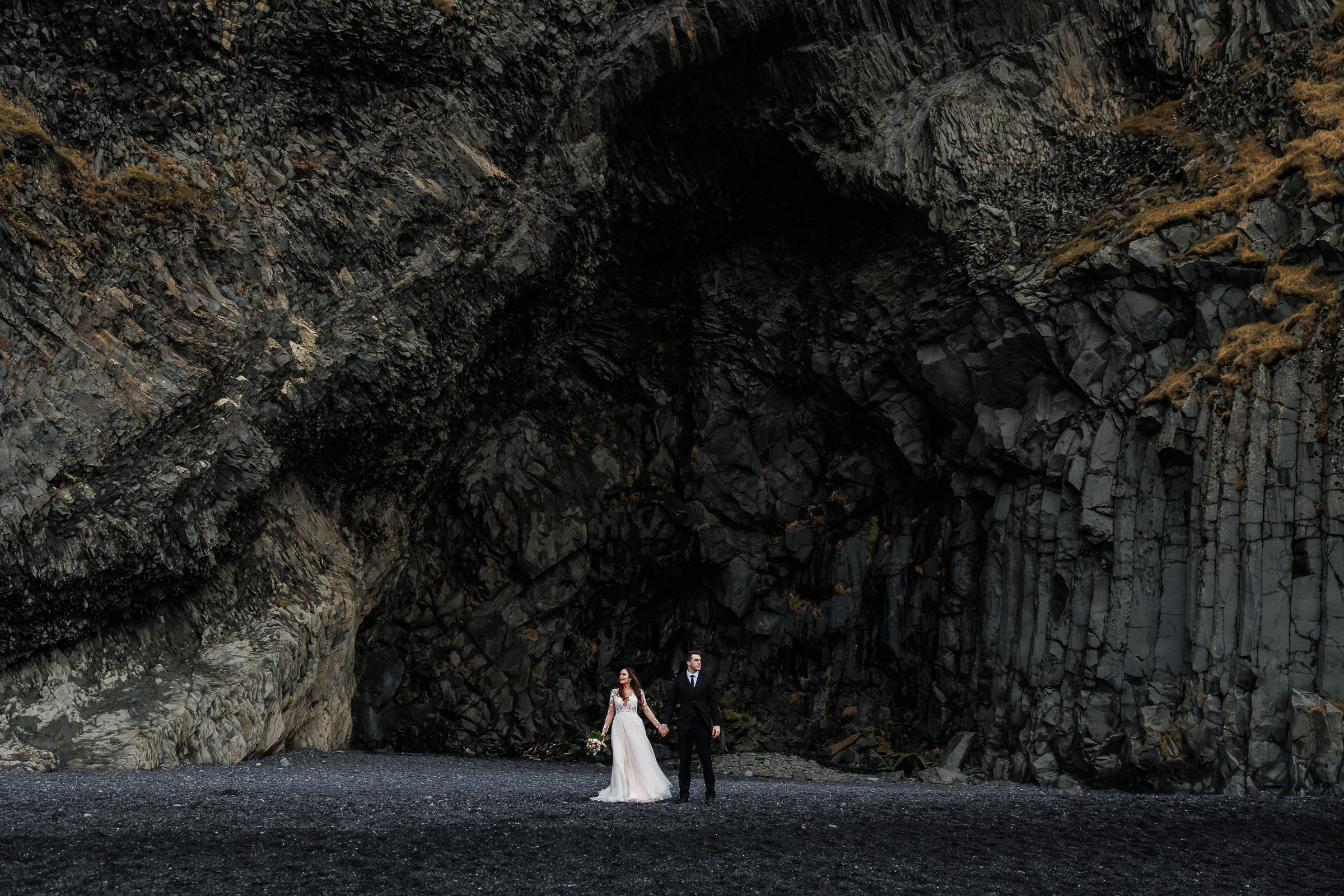 This couple eloped on Reynisfjara near Vik Iceland.