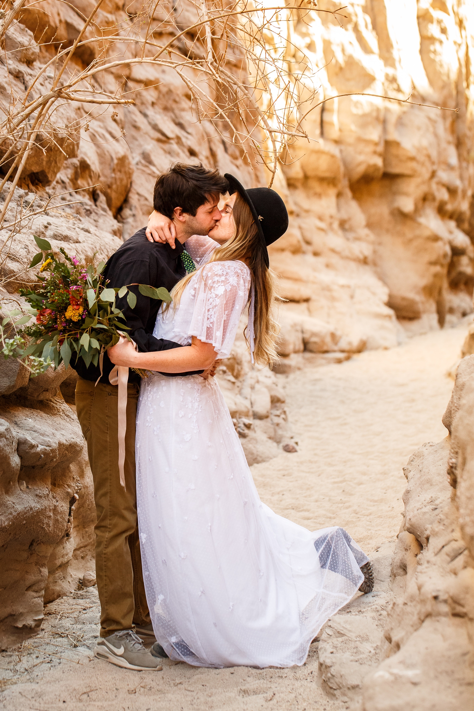 This couple share a unique slot canyon elopement in warm Southern California.