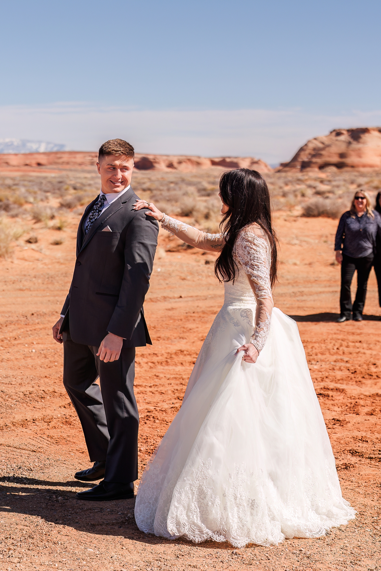 The Bride and Groom see each other for the first time during their adventurous elopement in the Utah wilderness