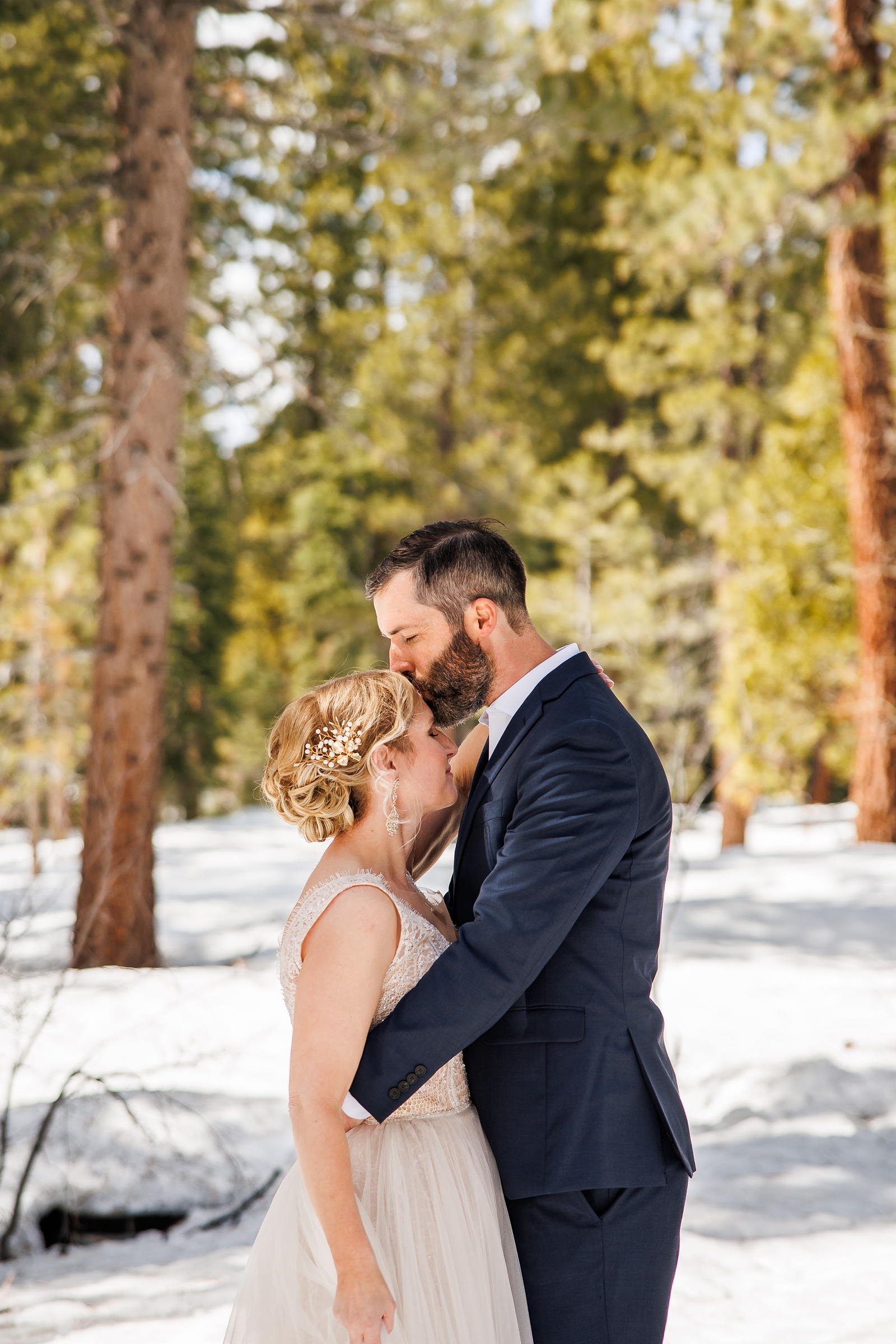 The happy couple embrace at Lake Tahoe.