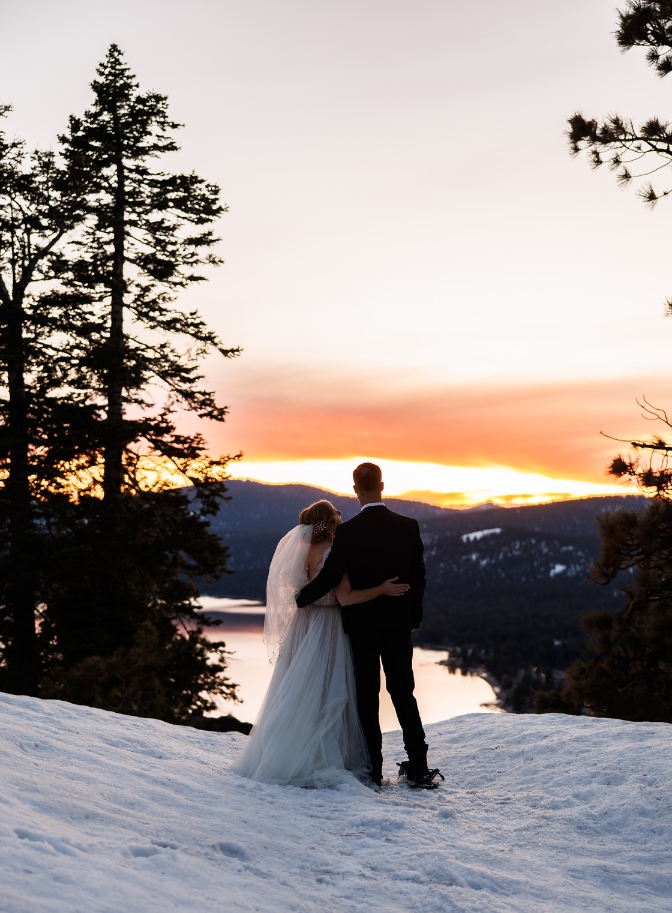photo of bride and groom watching sunset on their Lake Tahoe elopement