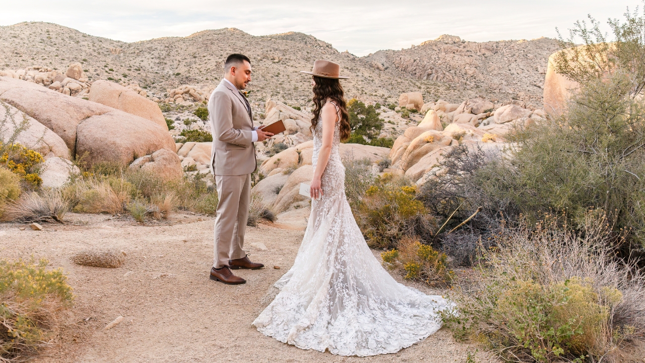 photo of bride and groom getting married at Joshua Tree and exchanging vows