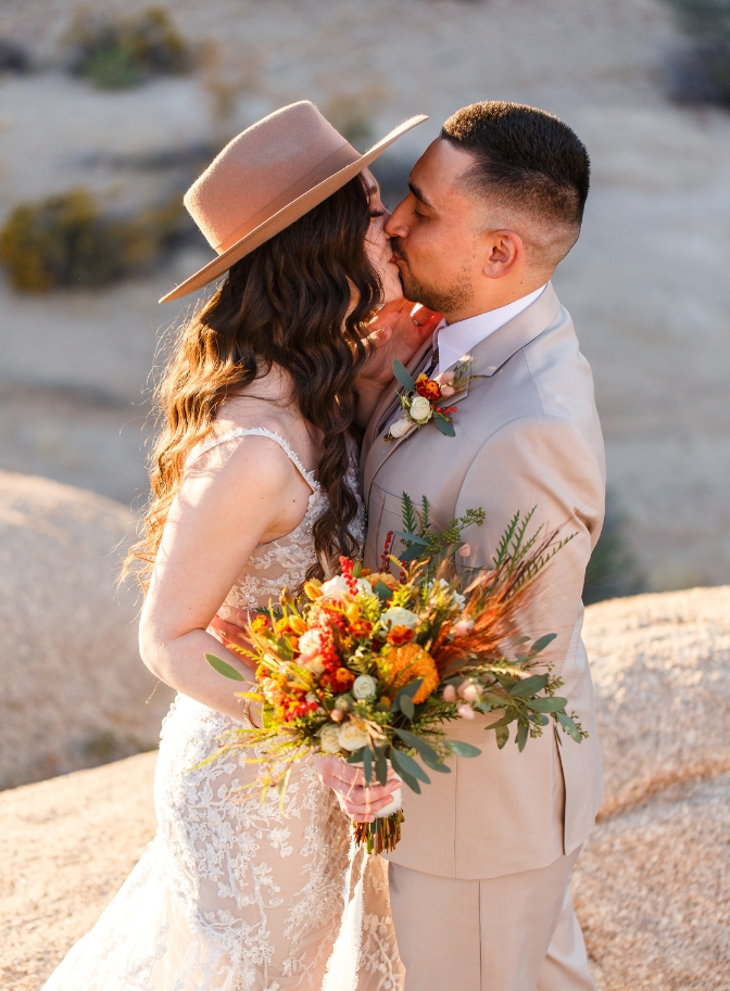 photo of bride and groom kissing for their adventure elopement