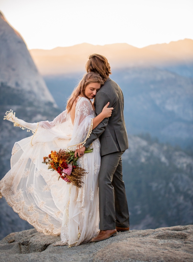 photo of bride embracing groom at their Yosemite elopement