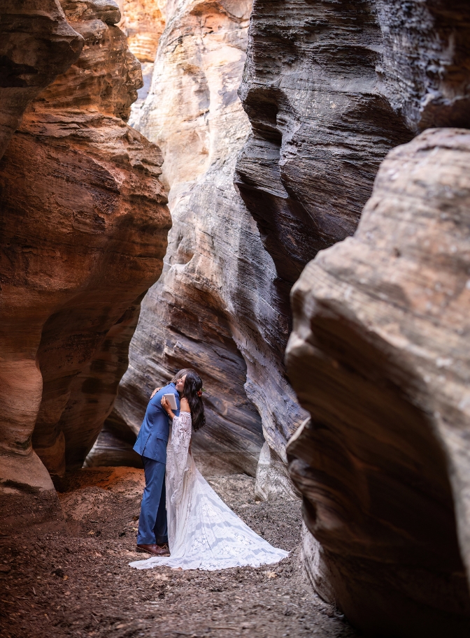 photo of bride and groom hugging after reading their vows in a private ceremony for their Zion elopement