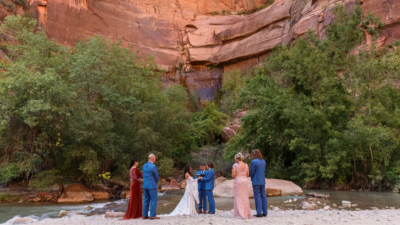 photo of bride and groom exchanging vows at the Temple of Sinawava at Zion 