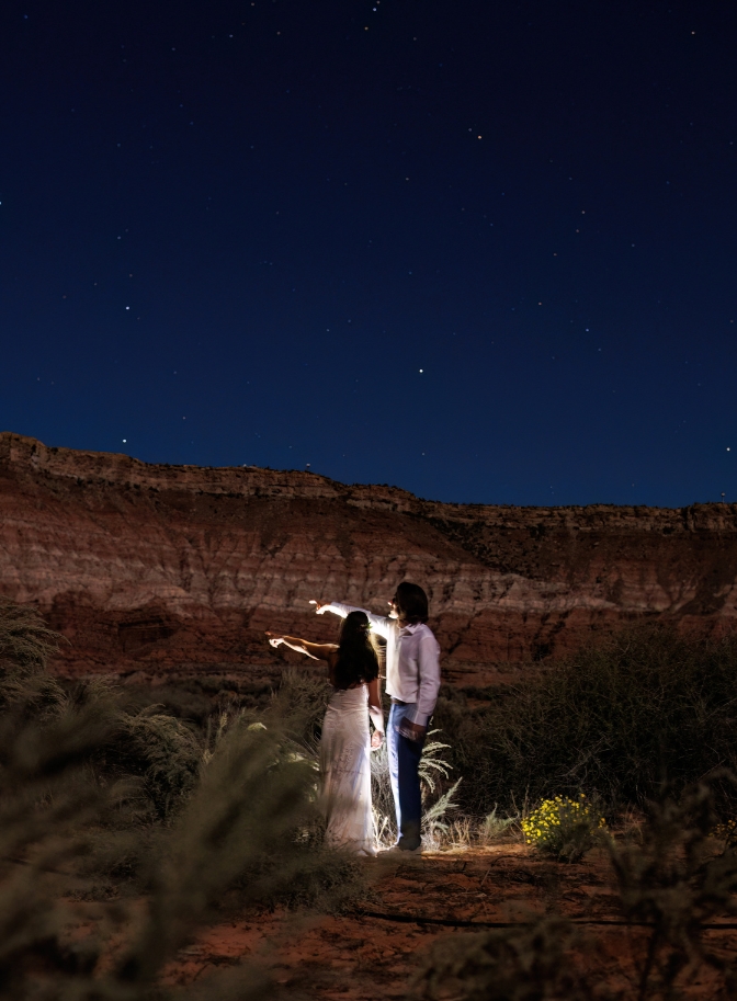 photo of bride and groom taking in the sights with the stars around them