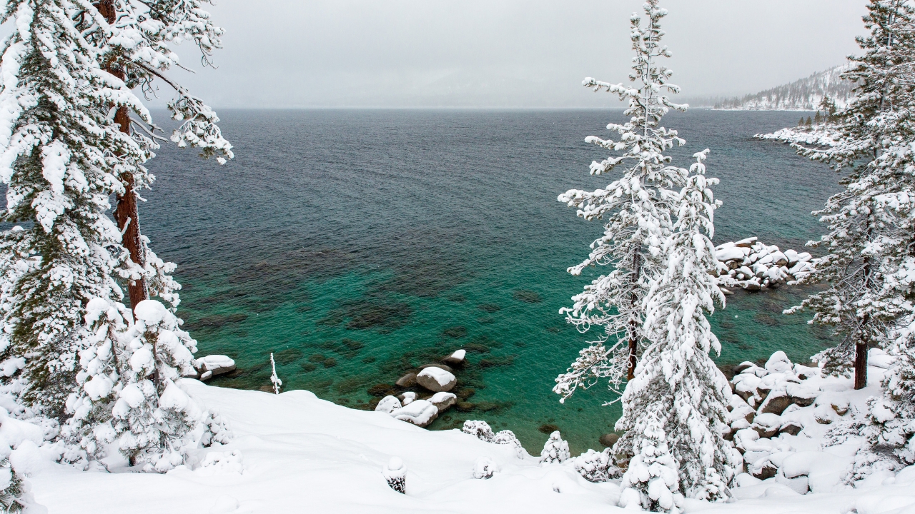 photo of Lake Tahoe covered in snow in the winter