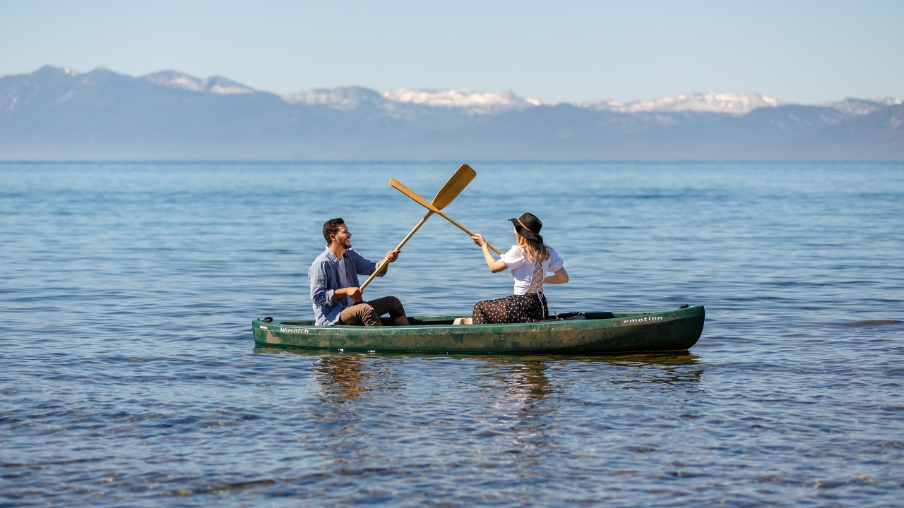 photo of couple in canoe at Lake Tahoe for engagement shoot