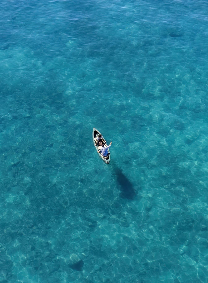 photo of canoe floating in Lake Tahoe