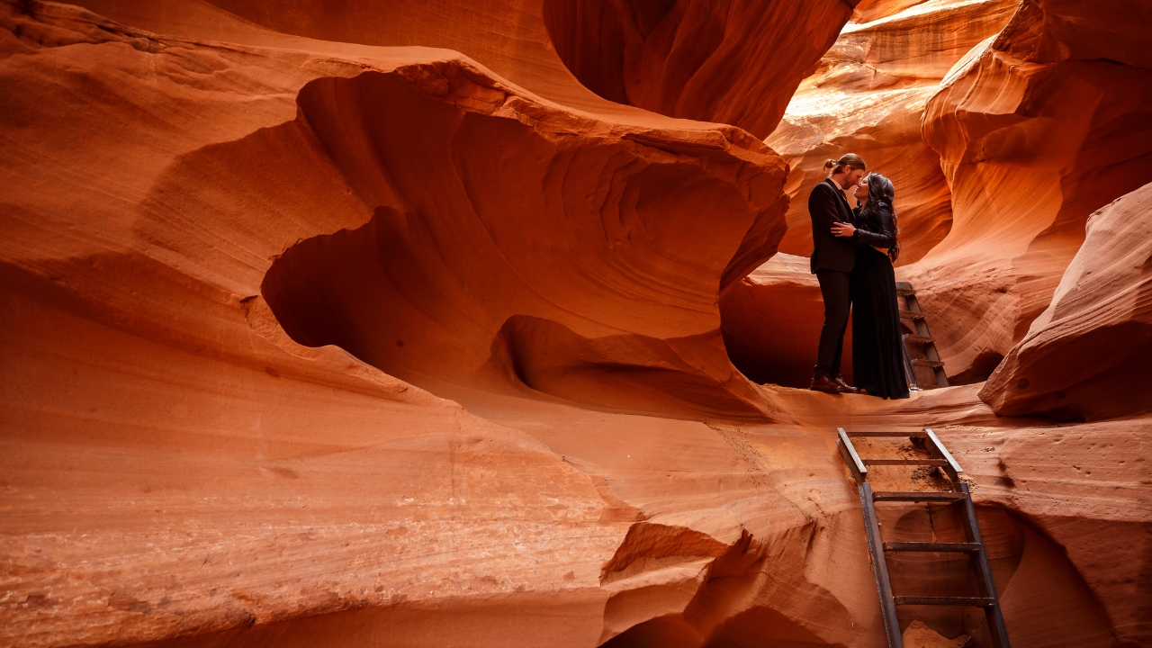 photo of bride and groom embracing and eloping in slot canyon