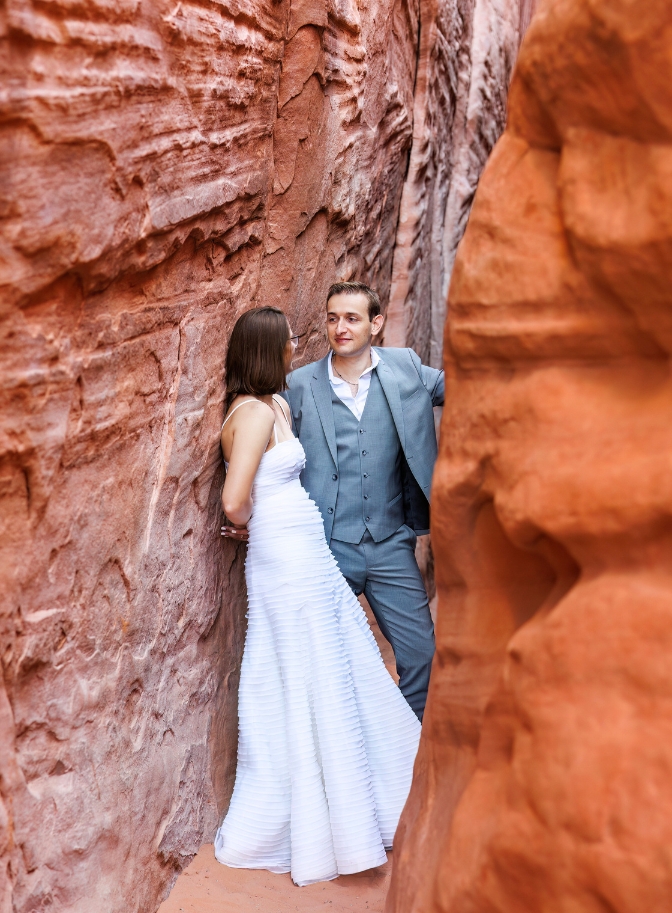 photo of bride and groom staring into each others eyes for slot canyon elopement