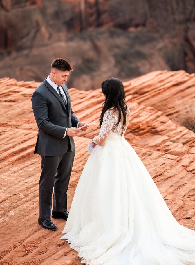 photo of bride and groom exchanging wedding vows at elopement