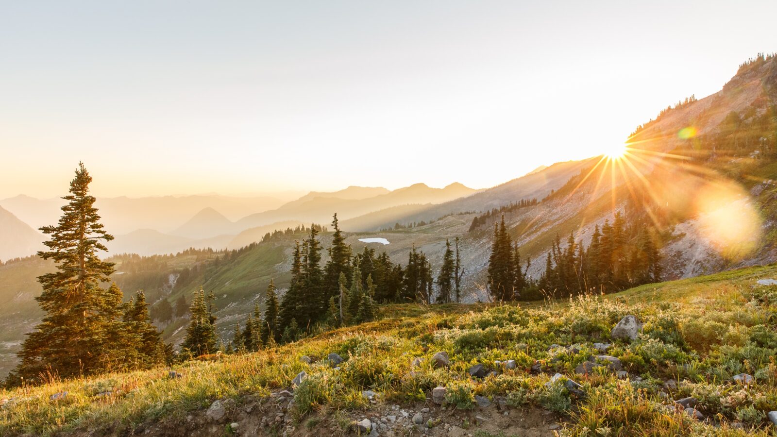 photo of Mt Rainier mountain range at sunset