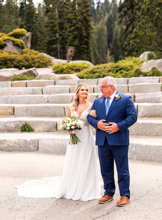 photo of father walking his daughter down the aisle of Yosemite elopement