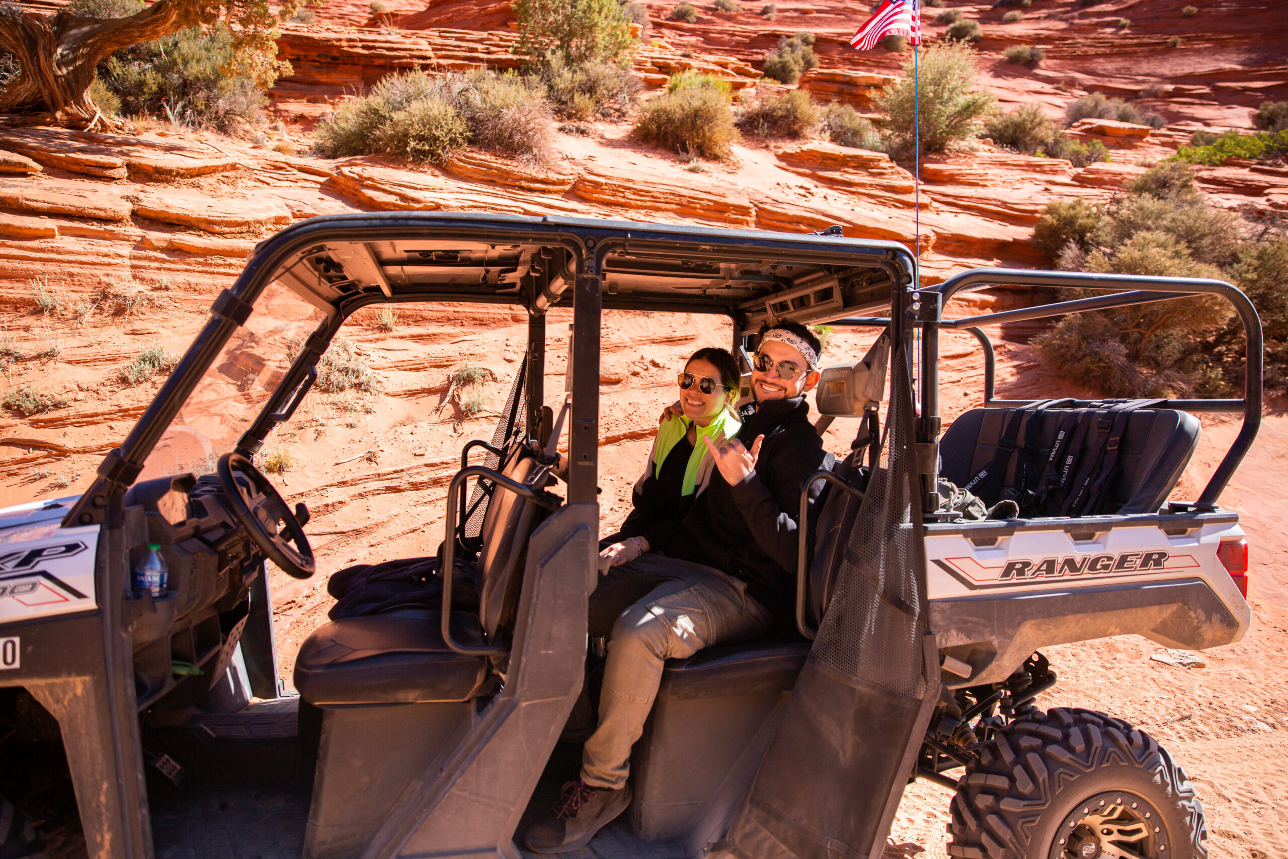 a couple on a UTV tour in Utah after months of planning a surprise proposal 