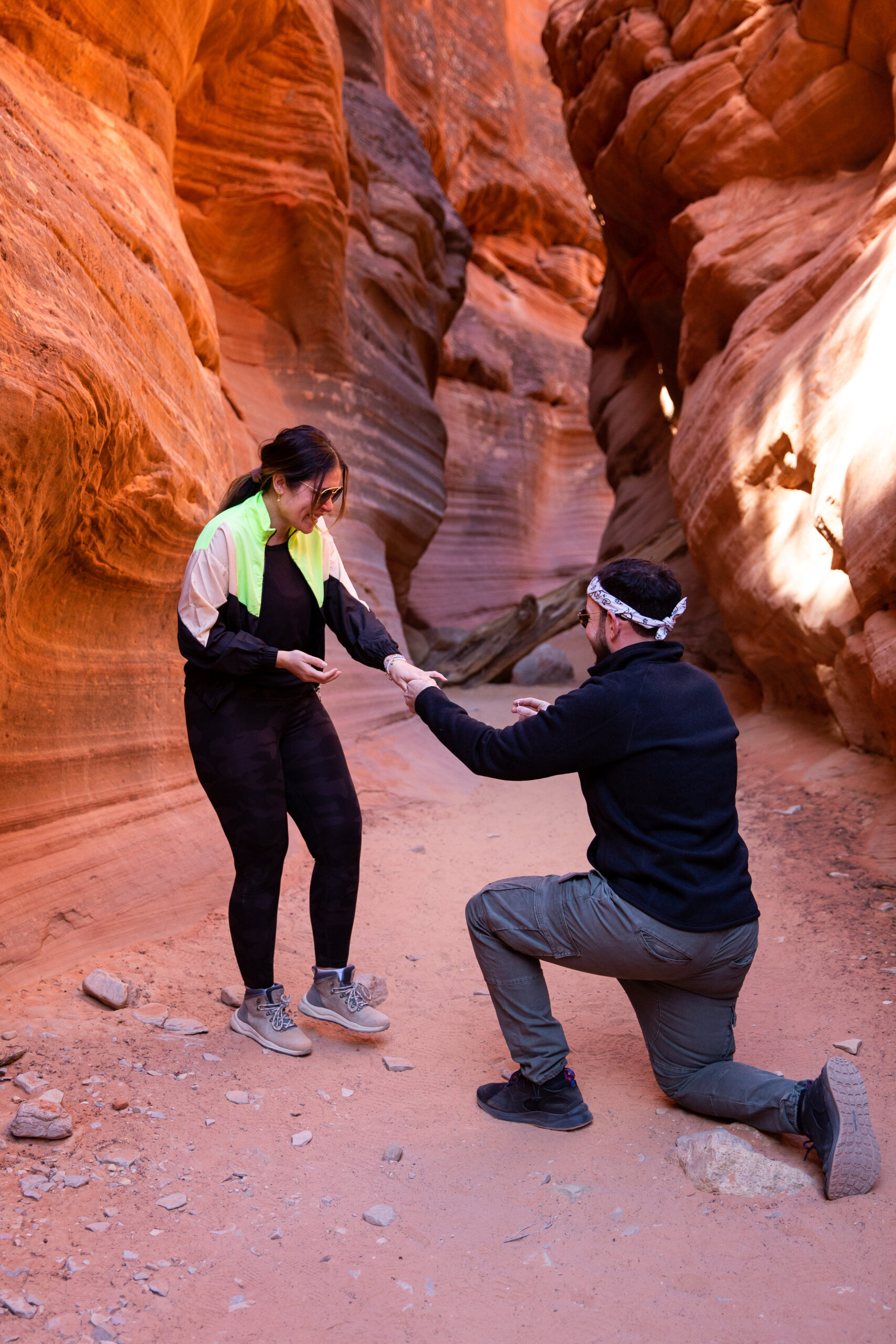 a man down on one knee proposing after months of planning