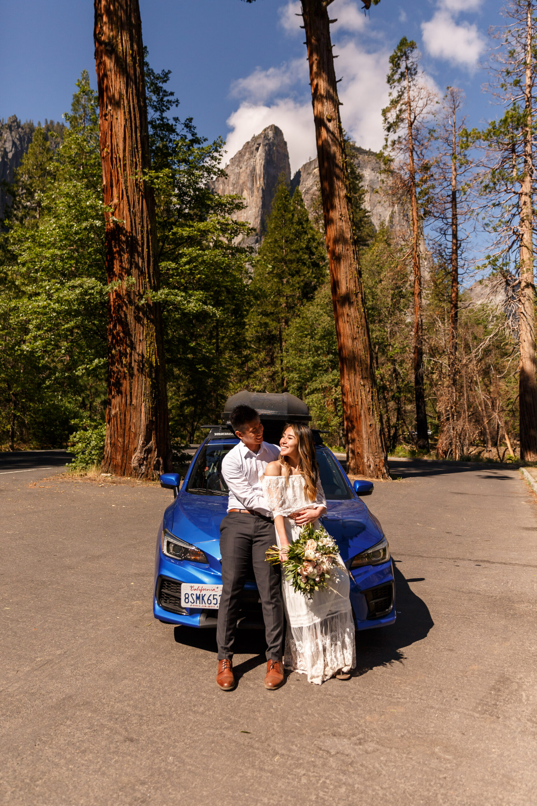 a married couple next to their car during an After Wedding Photoshoot