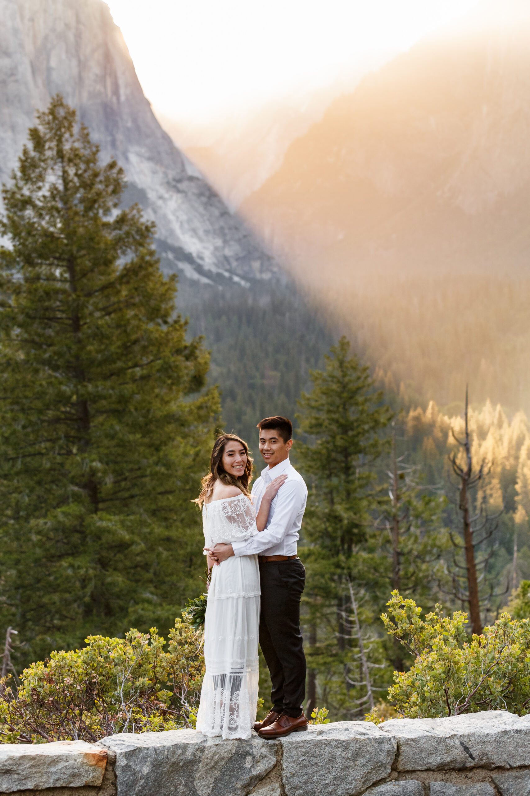 newly married couple smiling at the camera during their After Wedding Photoshoot