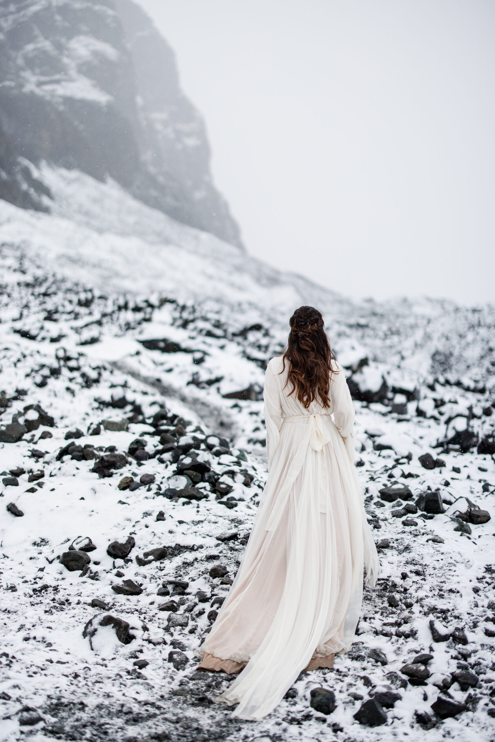 a bride in snowy Iceland during a winter elopement 