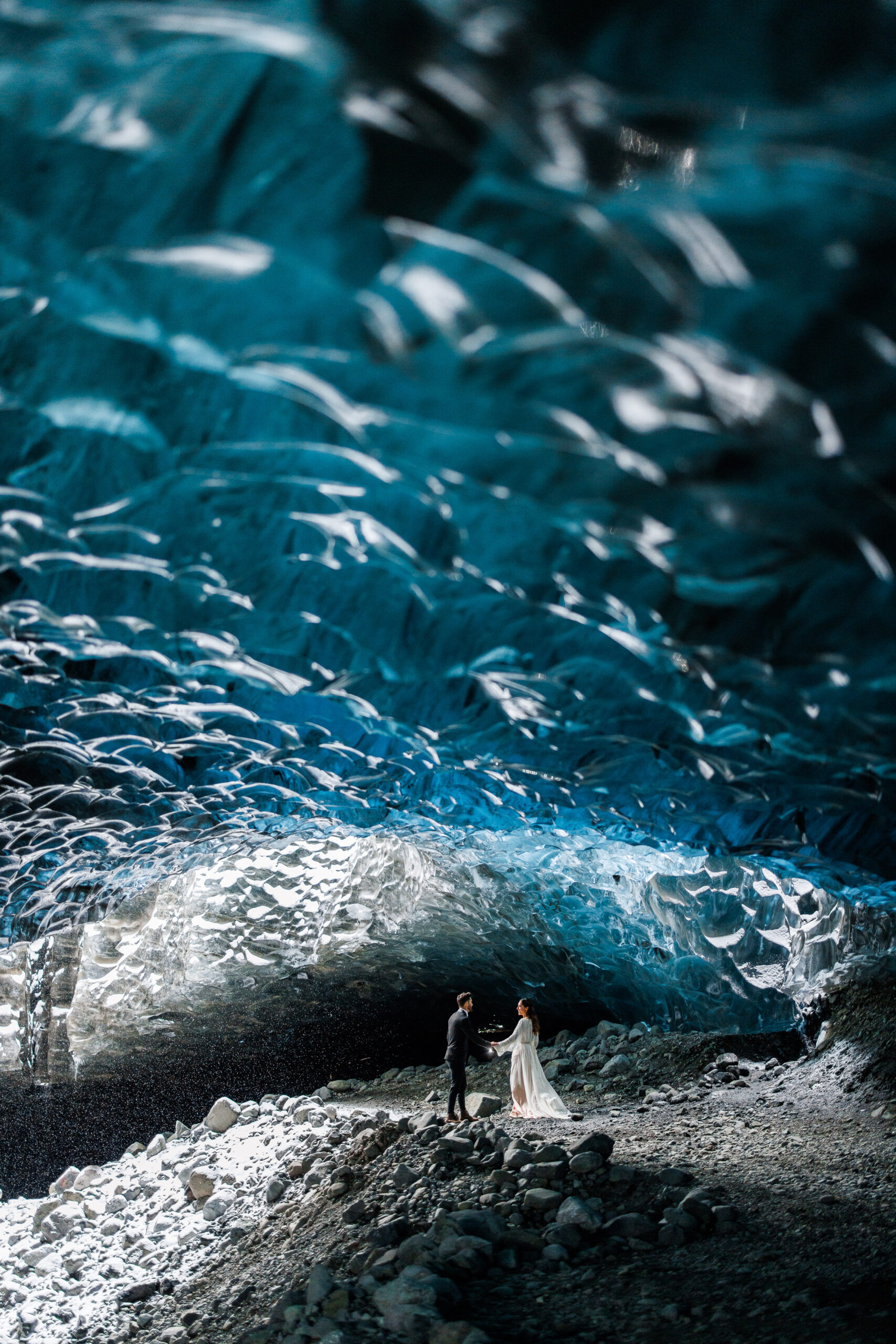 bridal couple in the ice caves in Iceland during their winter elopement