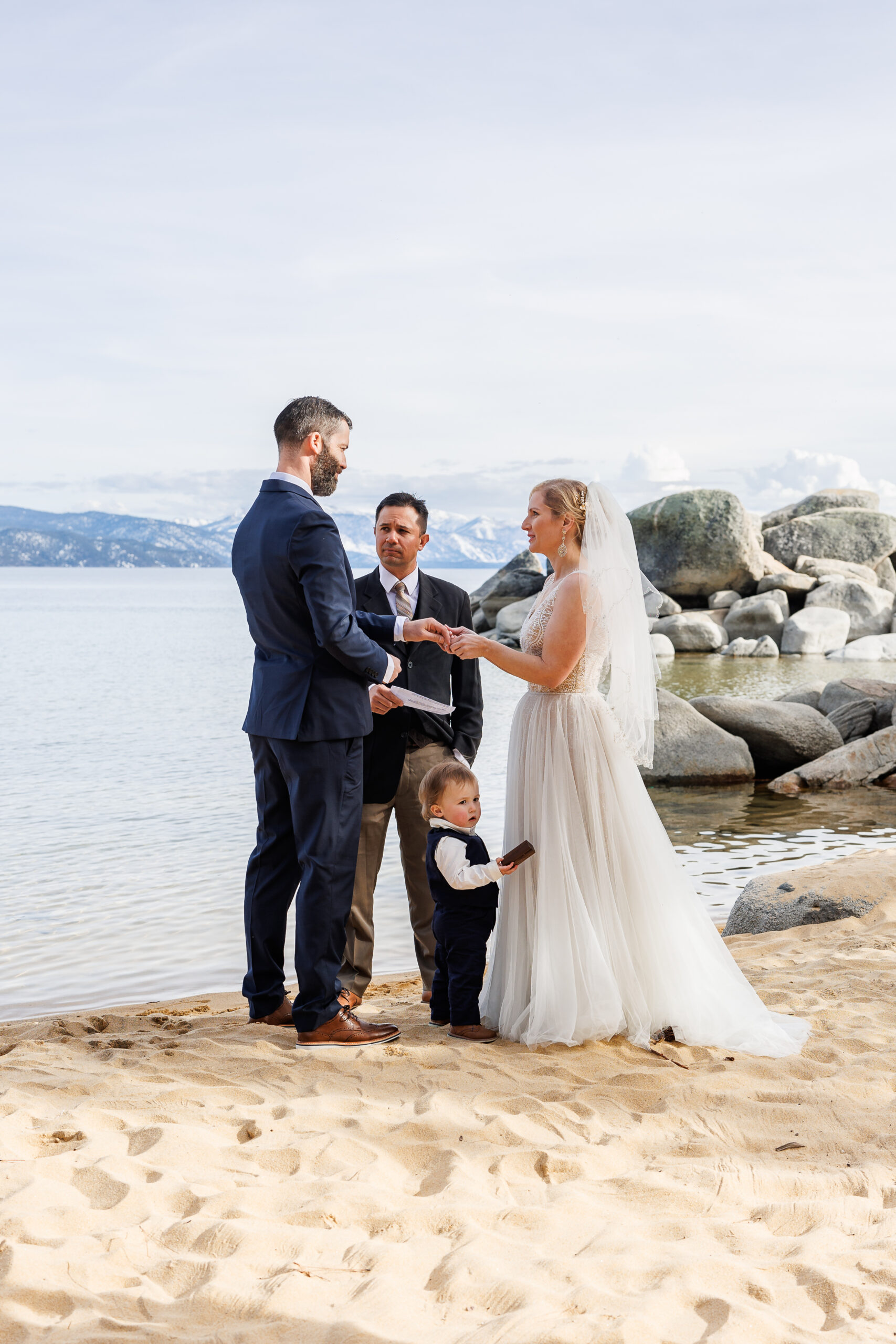 winter elopement ceremony on a beach in lake Tahoe 