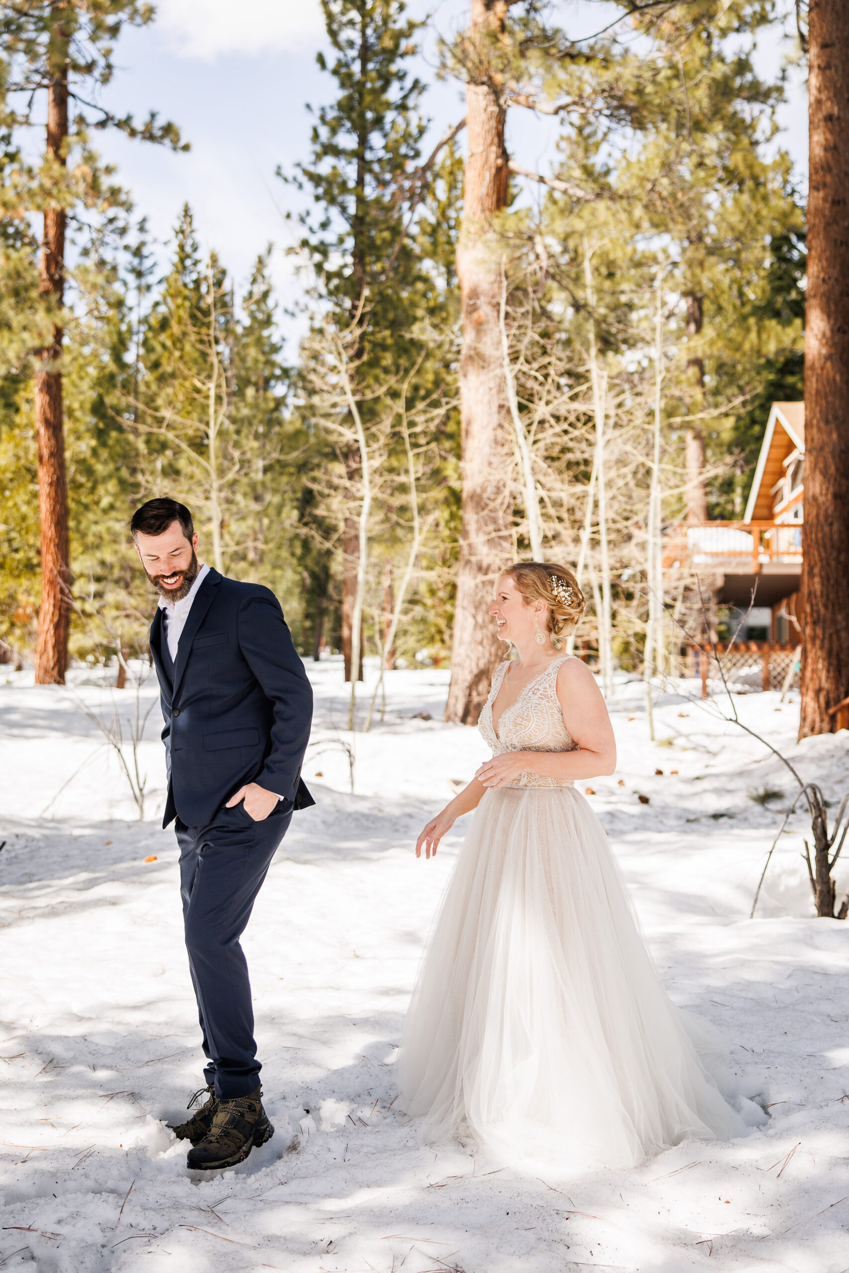 the groom about to see the bride for their first time for their winter elopement