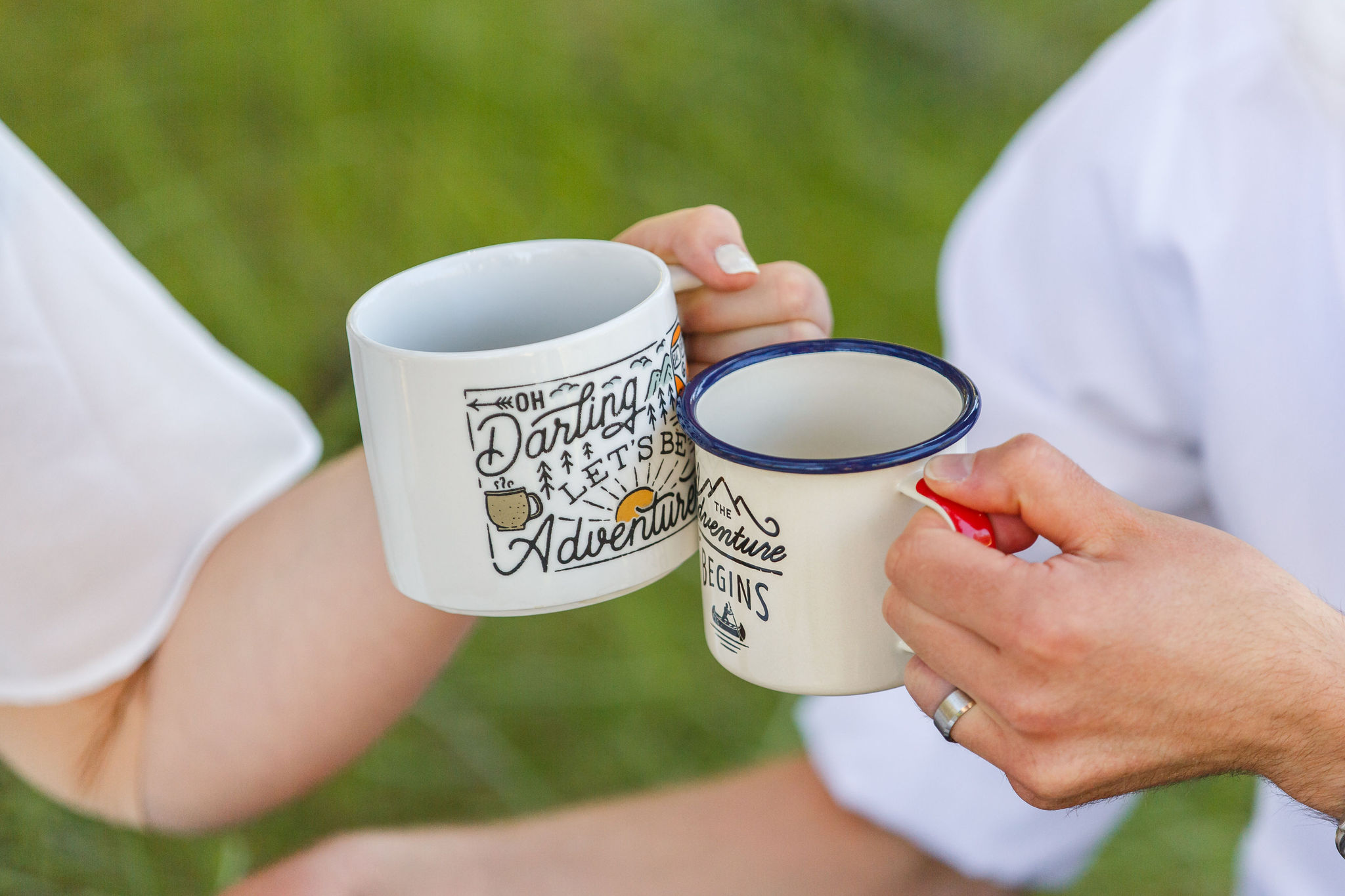 bride and groom toasting to their future during their picnic 