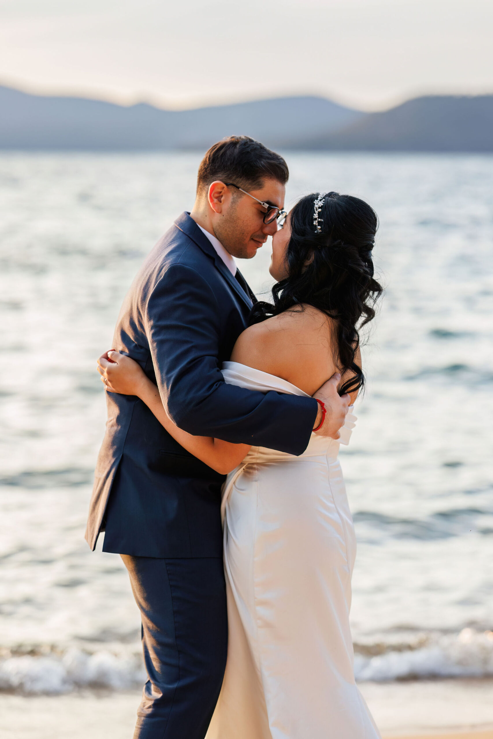 bride and groom dancing together 