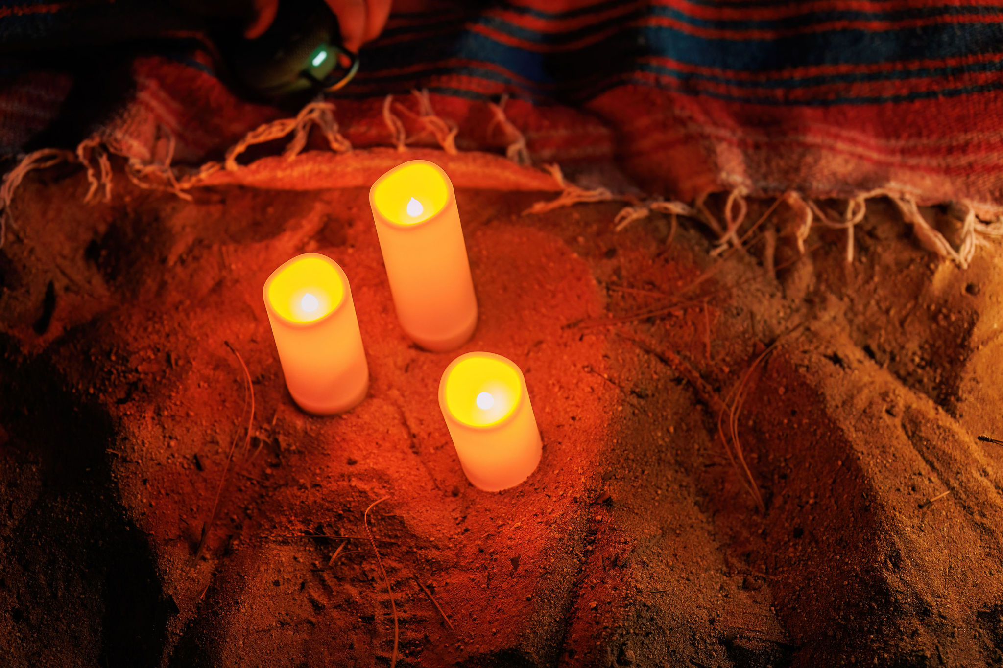 the battery operated candles in the sand 