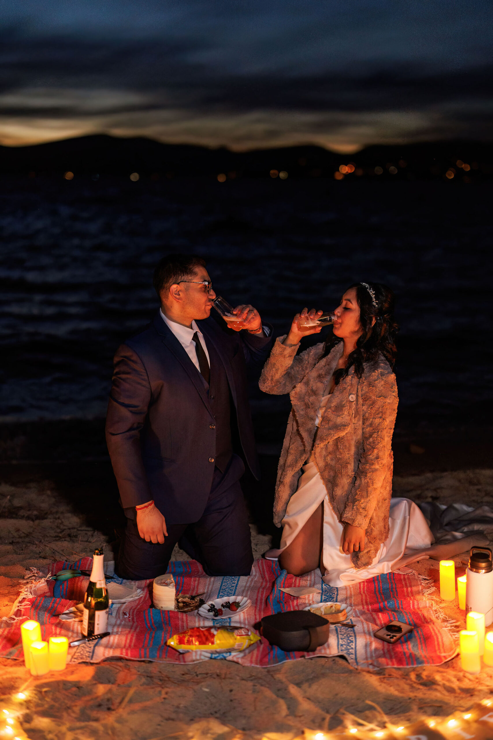 bridal couple toasting and drinking their cider