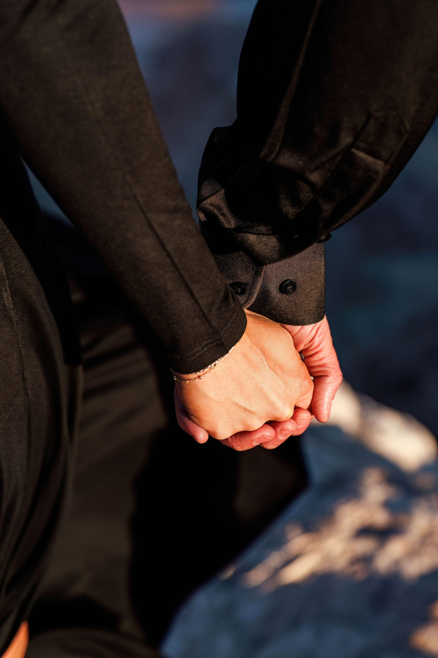 a couple holding hands during their Utah engagement photos