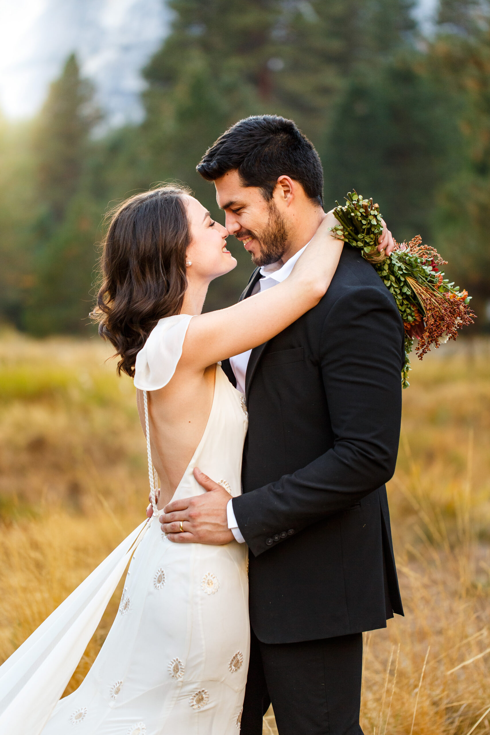 a couple touching noses during their Yosemite elopement 