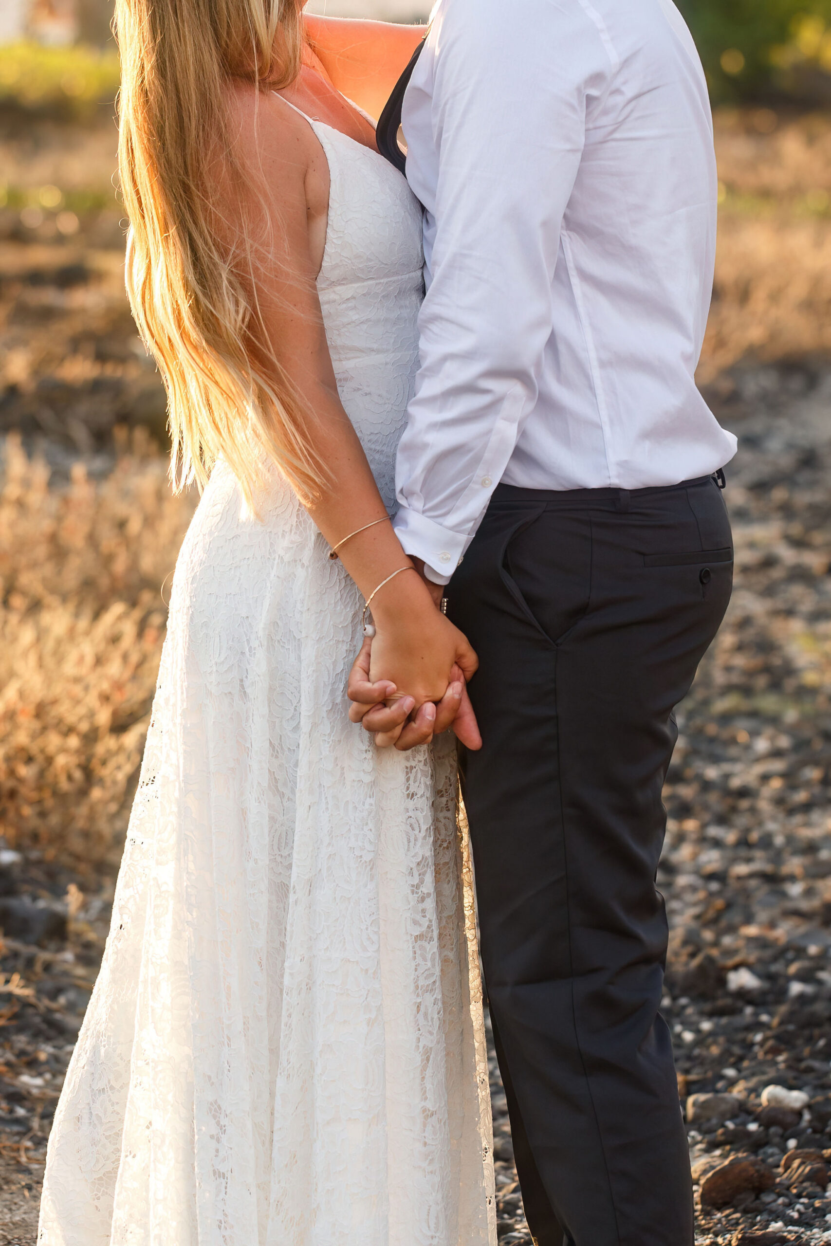 a couple holding hands for their Hawaii elopement 