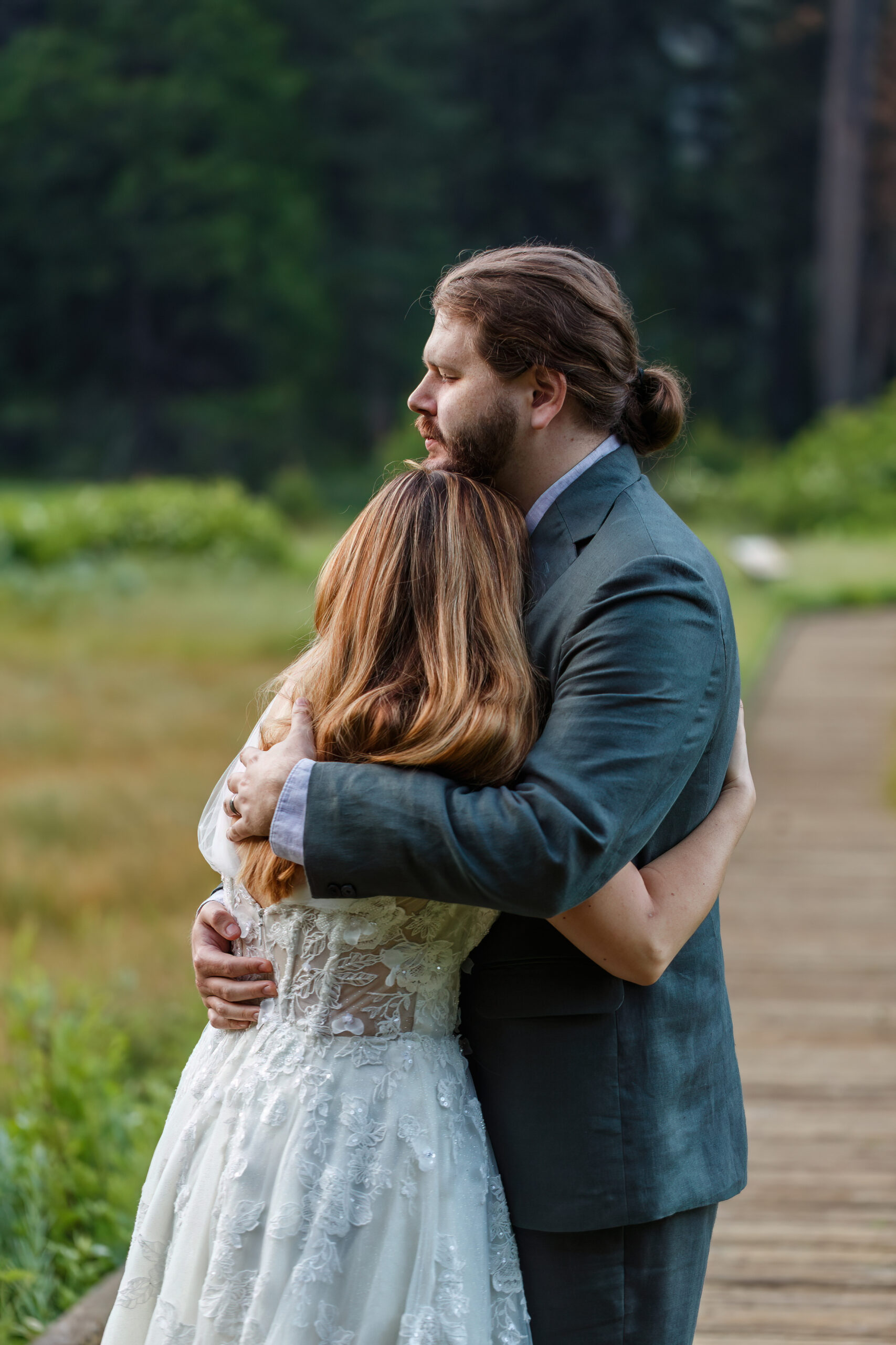 a couple embracing during their Yosemite wedding photos