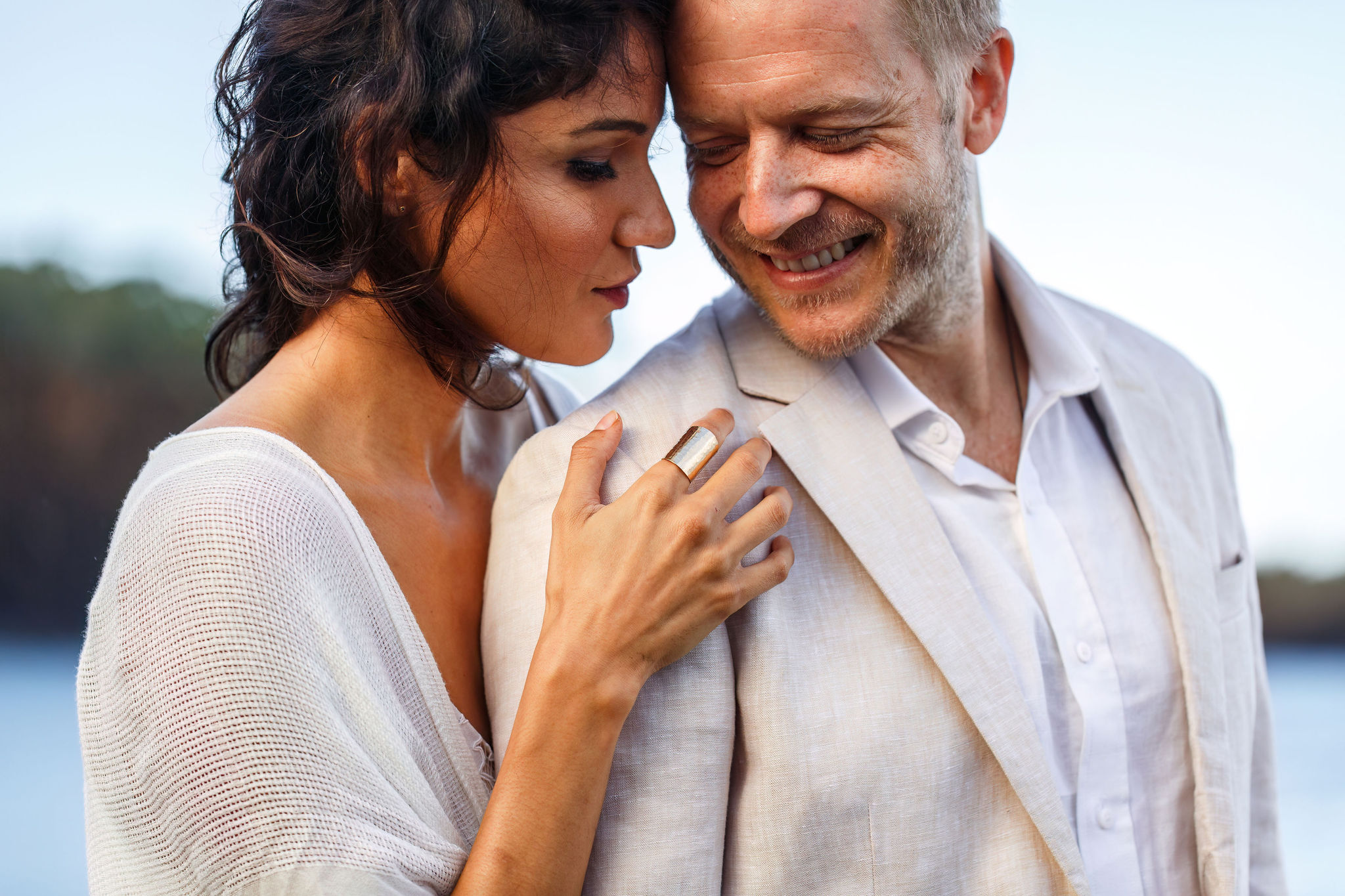 romantic Hawaiian elopement photos of a man and woman holding each other