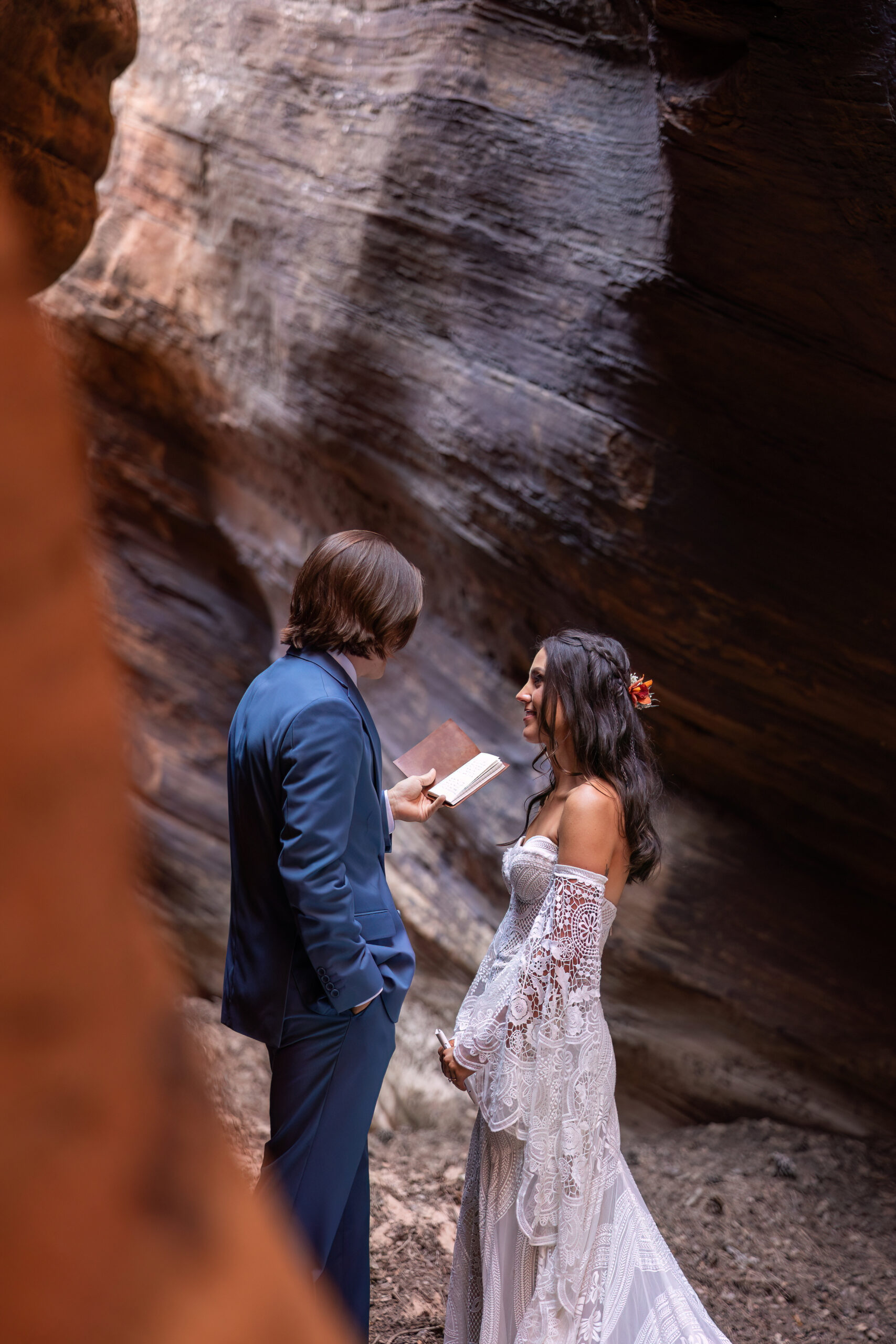 private vows in a slot canyon during their elopement timeline
