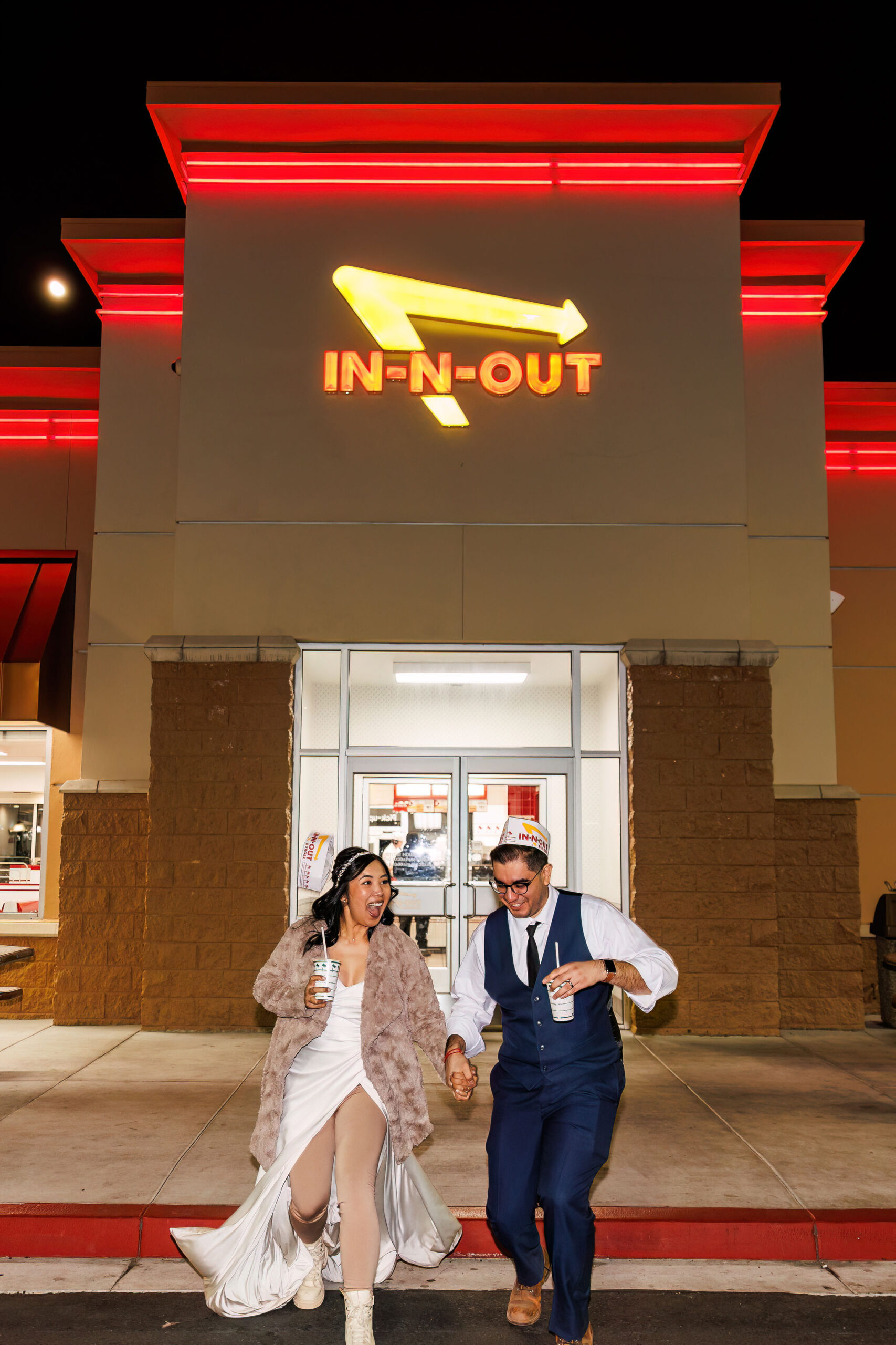 a couple getting in-n-out at the end of their elopement timeline