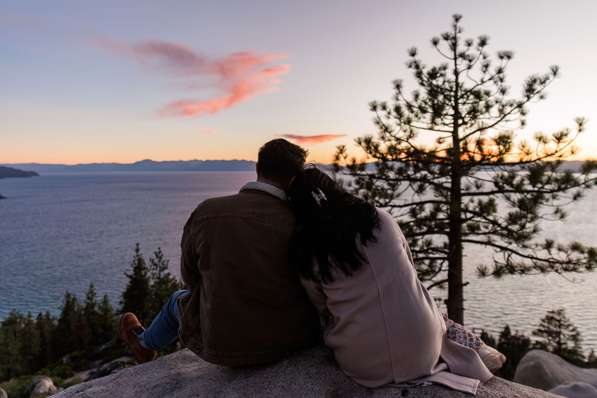newly weds enjoying the sunset during their adventure elopement