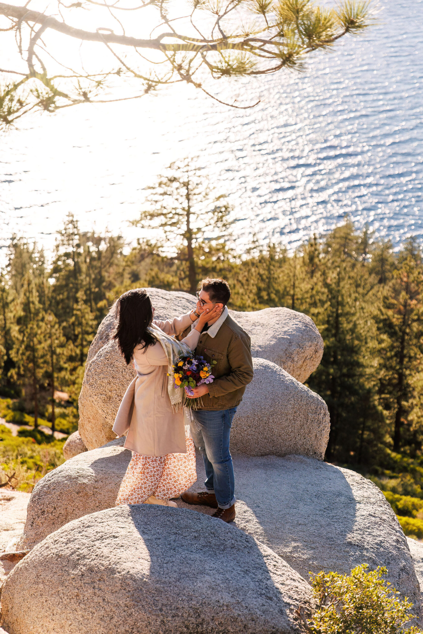 the bride holding the groom's face during their after session in Lake Tahoe