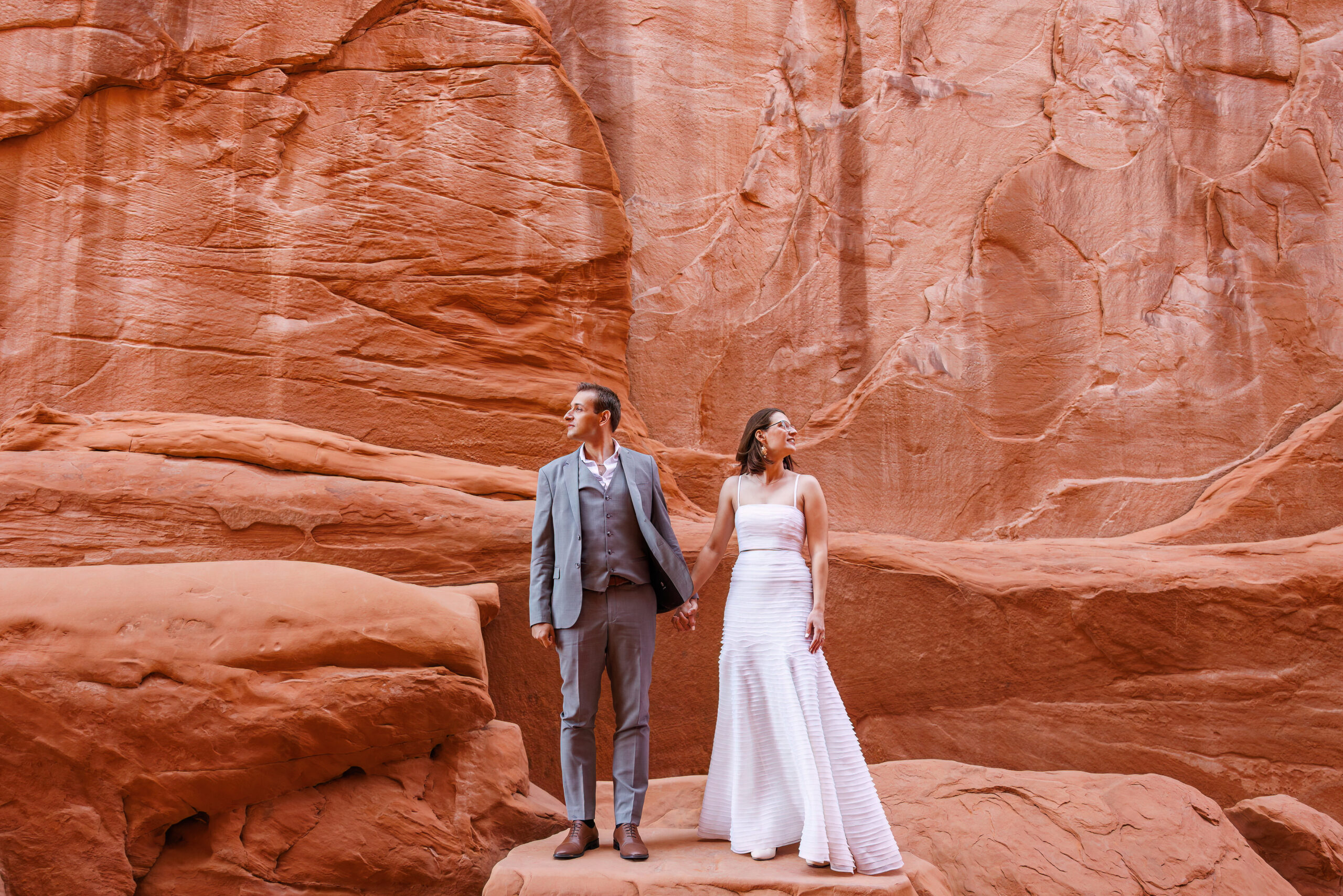 elopement portraits in front of a red rock wall