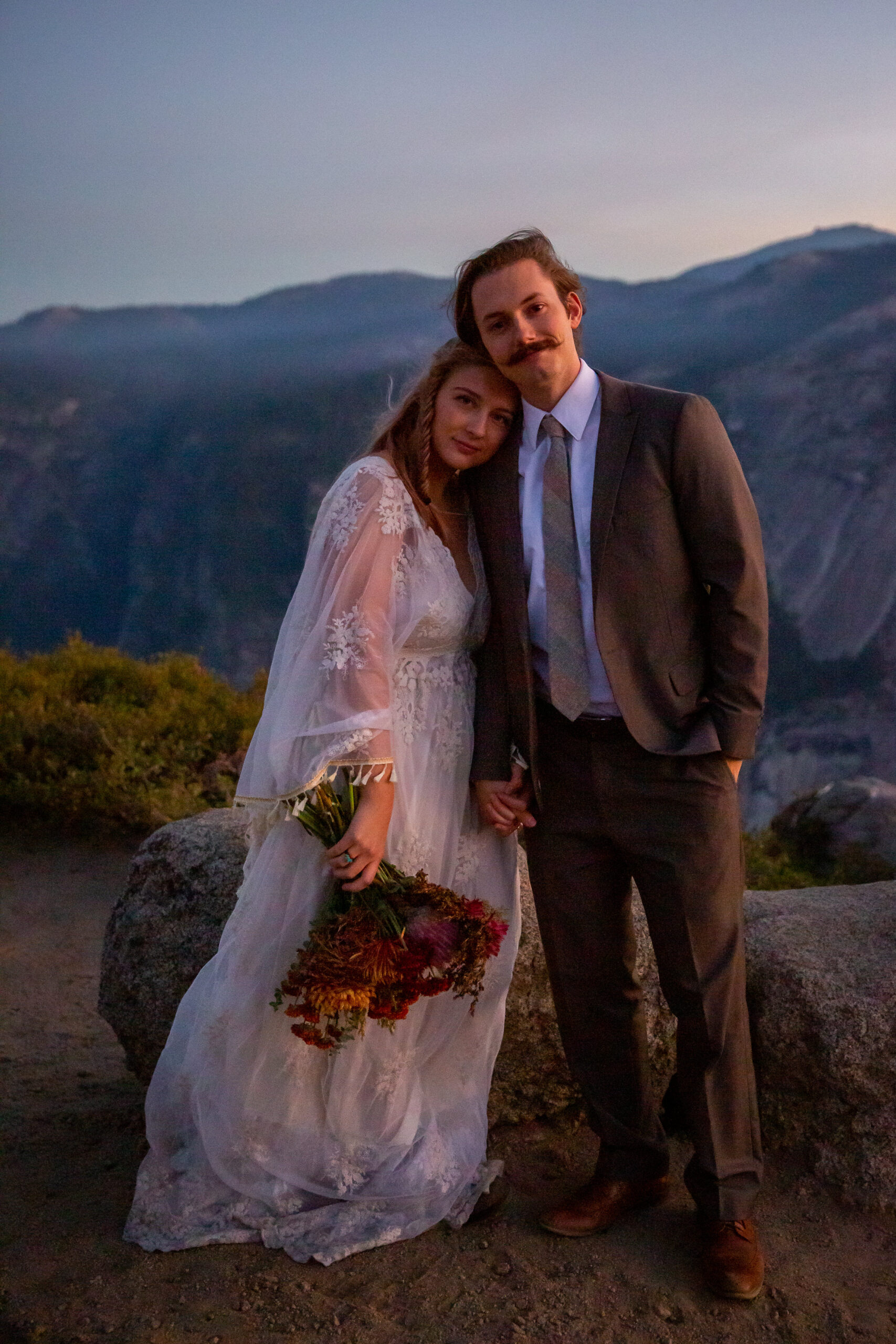 newly weds at sunrise, the first stop in their elopement timeline