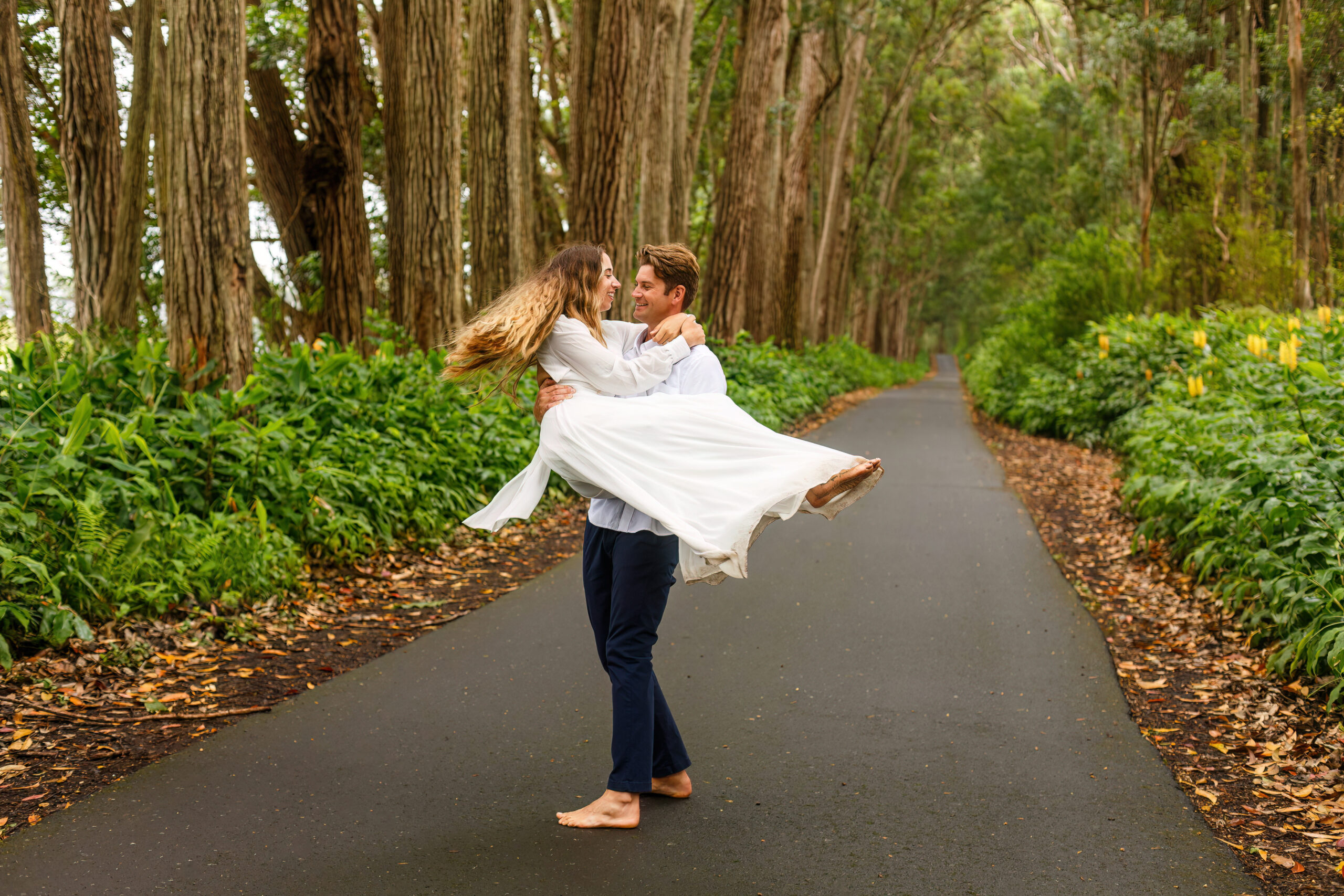 a man spinning a woman around during their elopement