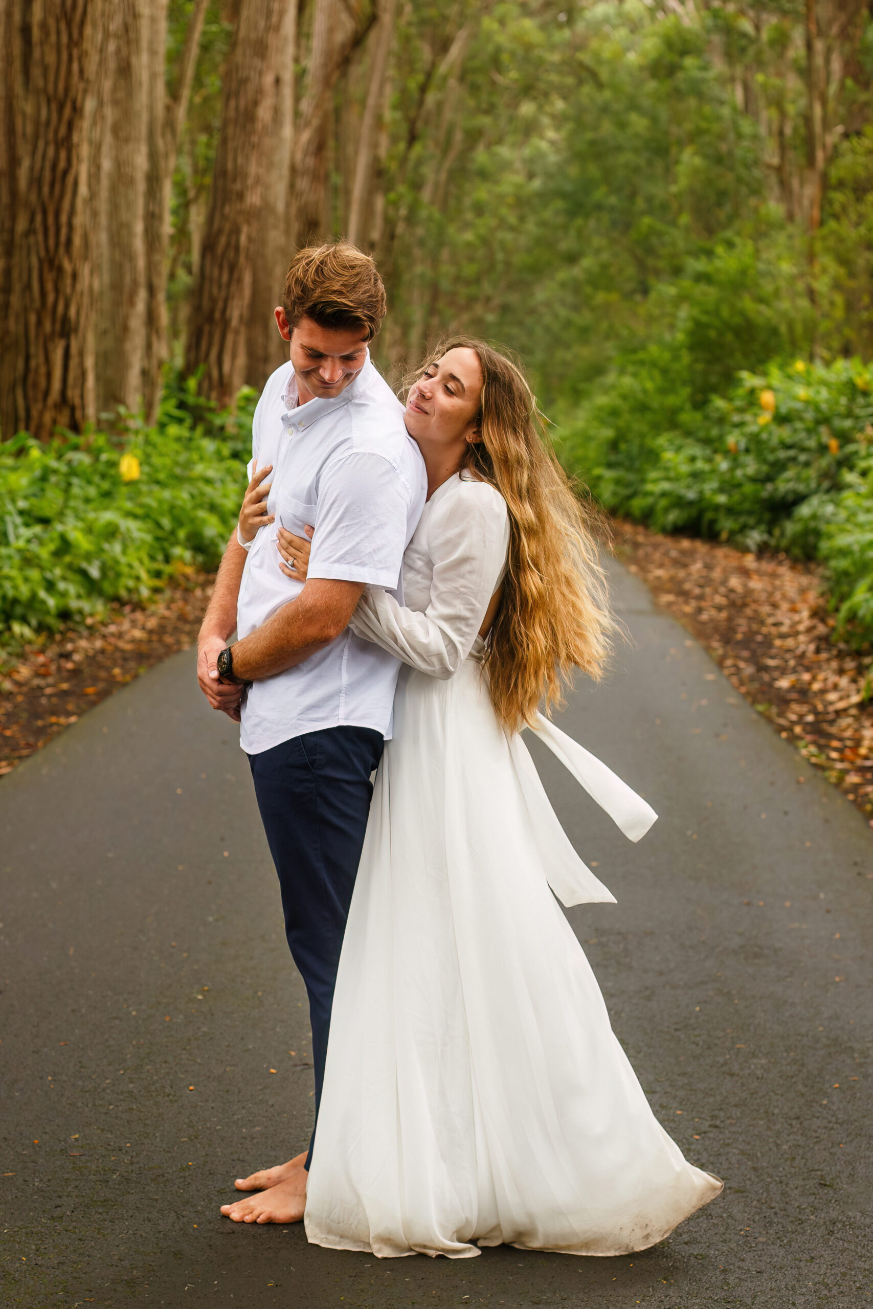 a woman hugging a man from behind during their adventure elopement