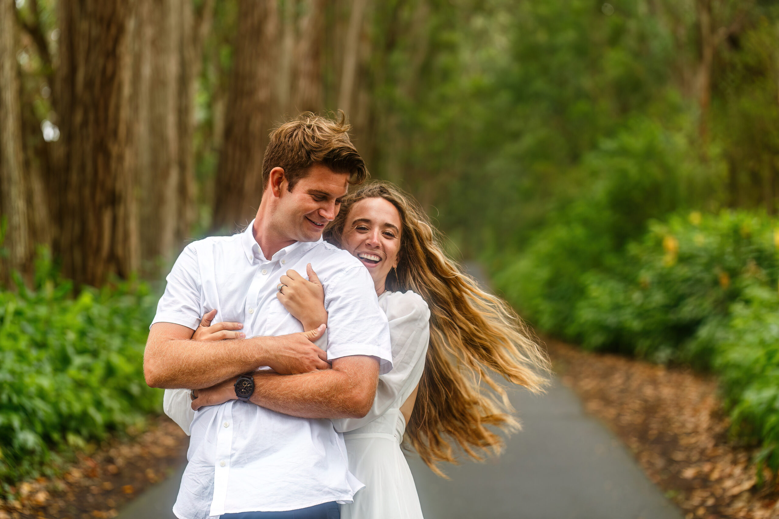 a man and woman laughing together during their destination elopement