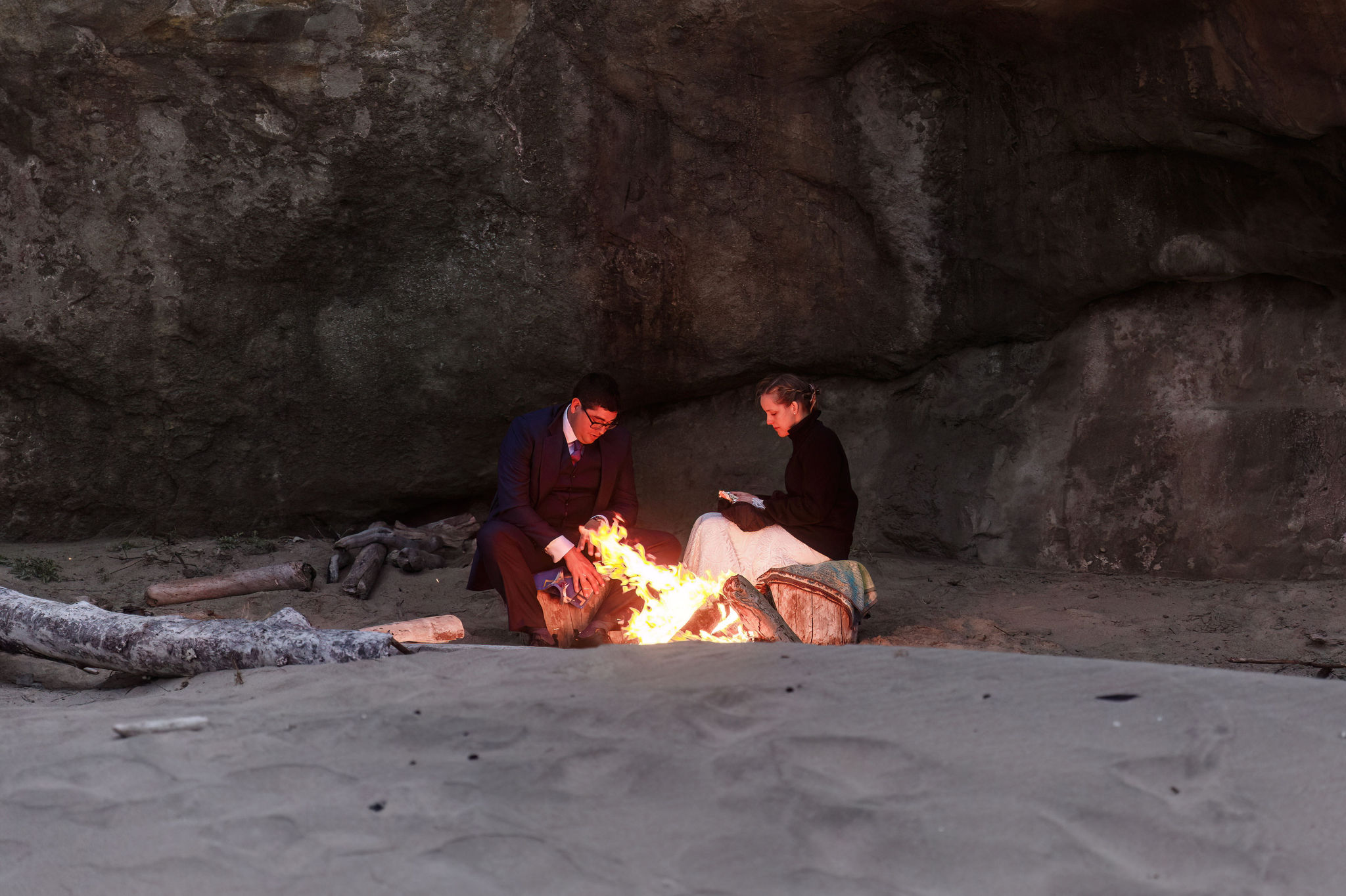 newly weds having a bonfire on the beach during their Point Reyes elopement