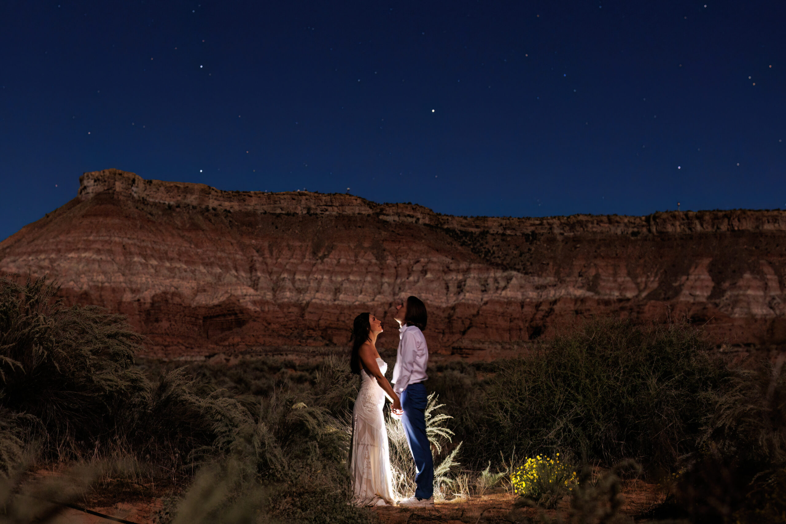 a night elopement photo with the stars
