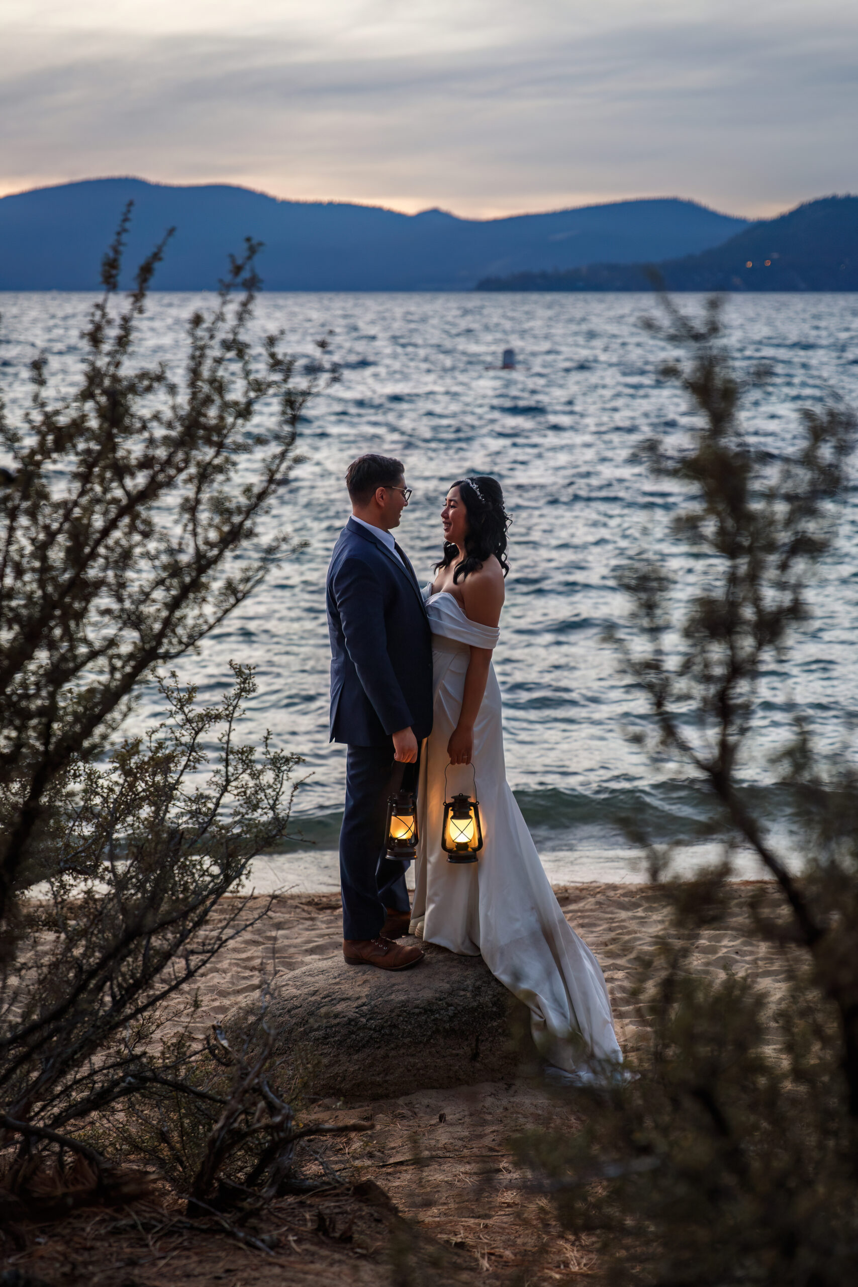 a night lantern wedding photo on the beach 