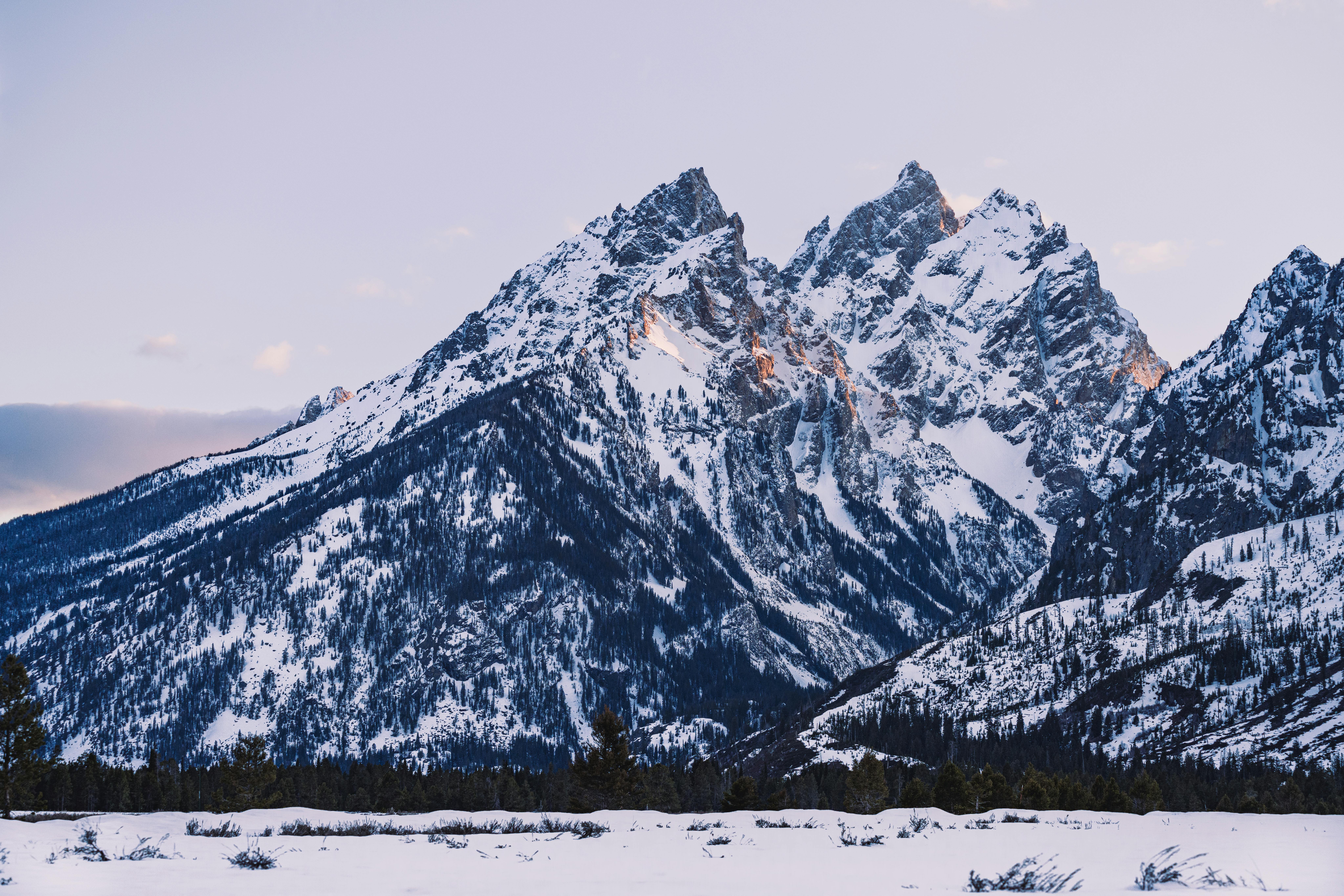 the teton mountains covered in snow 
